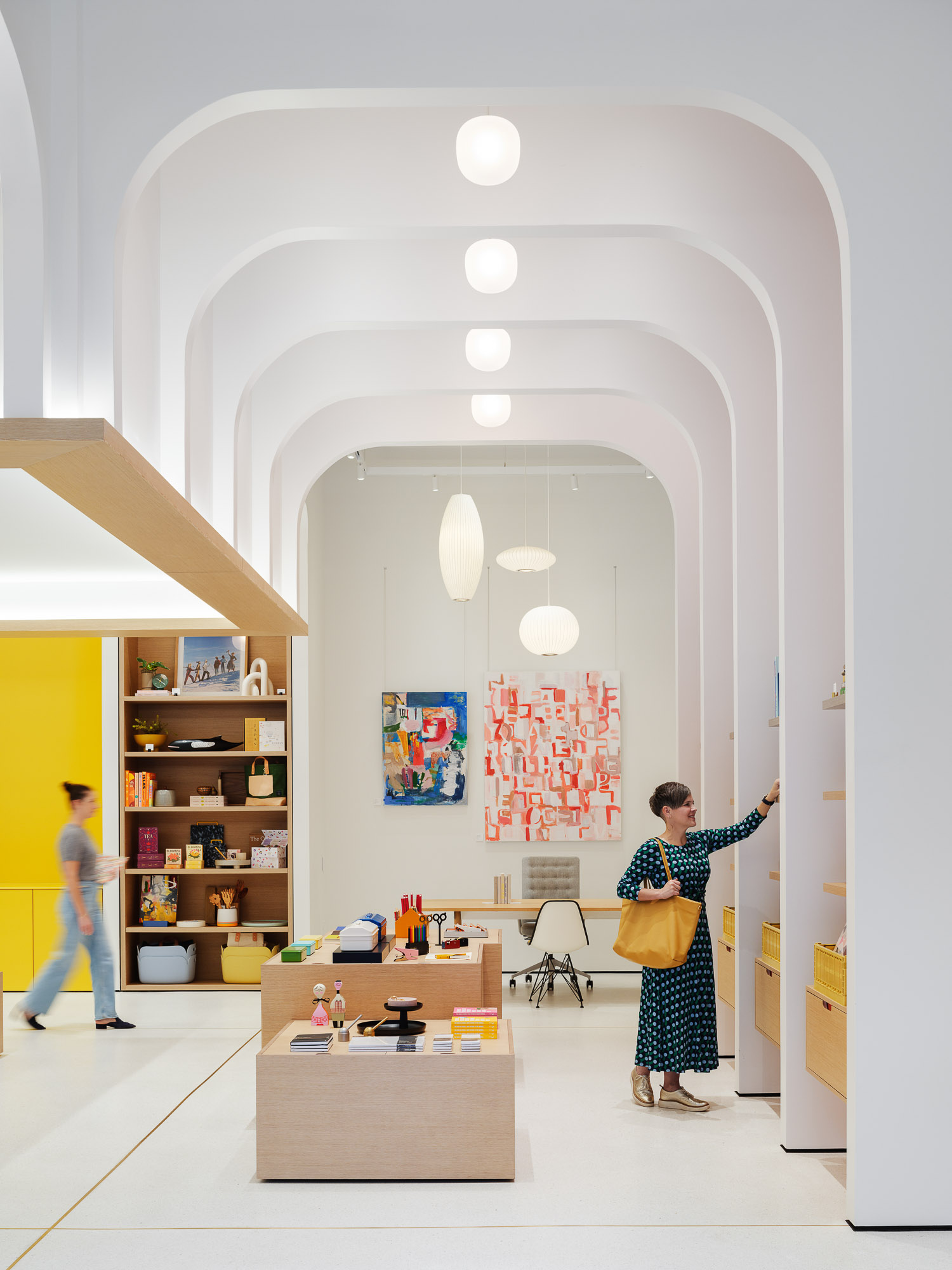 Two women shopping at Adorn Denver retail space