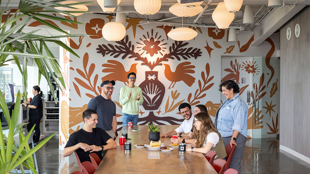 A group of people around a table.