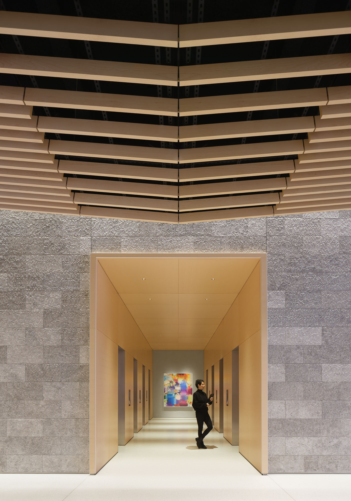 A person walking through a building.