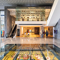 A group of people in a building.