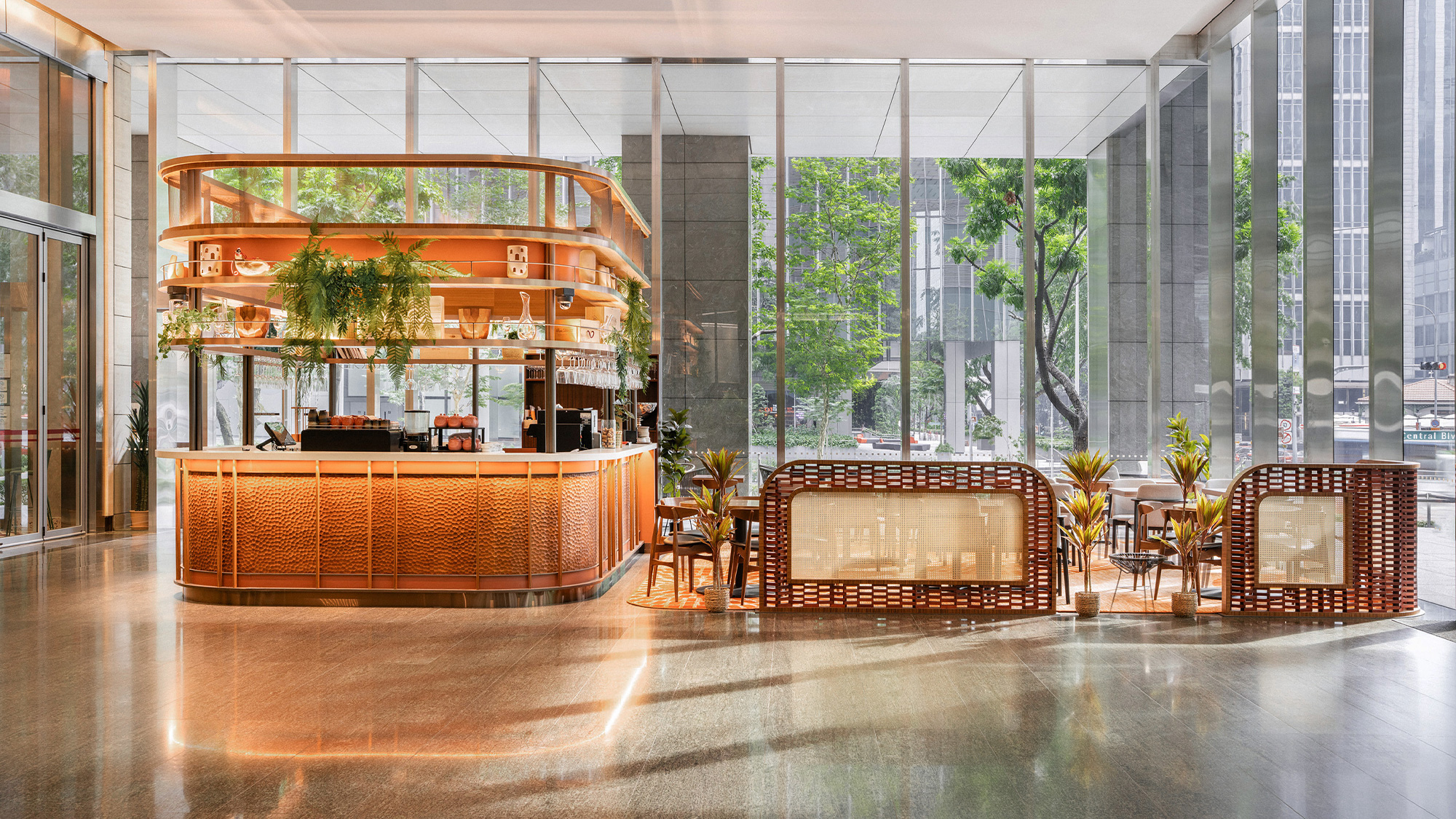 A large room with a large glass wall and a large table with chairs.